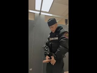 cop jerks off in the toilet